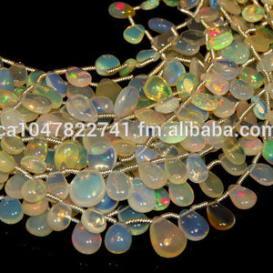 Perles d'opale éthiopienne AAA+ de haute qualité, forme poire, gouttes planes, vente en gros à prix compétitifs - Product Image 1