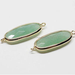 Fabricación de joyas de doble fianza con corte de cuadros ovalados de Aguamarina con material de aleación duradero - Product Image 1