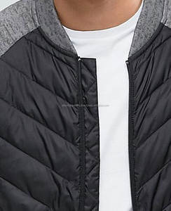 เสื้อแจ็คเก็ตพัฟเฟอร์แบบมีฮู้ดสำหรับฤดูหนาว รุ่นใหม่ล่าสุด ไซส์ใหญ่ กันน้ำ ปิดด้วยซิป แขนเสื้อแบบถักและแบบแร็กแลน - Product Image 2