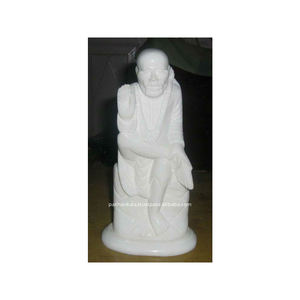 Statue en marbre blanc poli du dieu hindou Sai Baba en position assise avec la main en bénédiction, à utiliser pour le culte - Product Image 1