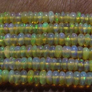 Opale éthiopienne lisse en forme de rondelle perles de pierres précieuses fabrication de bijoux naturelle. bonne qualité - Product Image 1