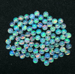 Cabochon en opale de feu éthiopienne naturelle de 4mm AAA + Grade Multi Fire Pierres précieuses en vrac de haute qualité IGI Certified Thermal Treated Wholesale - Product Image 1