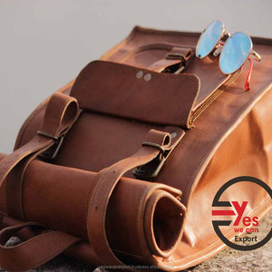 กระเป๋าเป้หนังแท้กันน้ำสไตล์วินเทจสำหรับทุกเพศ เหมาะสำหรับโรงเรียน มหาวิทยาลัย ท่องเที่ยว แคมป์ปิ้ง ขนาด 21 นิ้ว จำหน่ายจำนวนมากสำหรับวัยรุ่น - Product Image 1