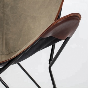 Silla de mariposa de hierro con asiento de lona y adorno de cuero - Product Image 3