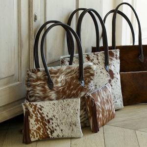 Embrague de piel de vaca moteada de alta calidad Embrague con estampado de animales Bolsos pequeños de lujo - Product Image 3