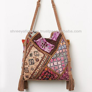 Vintage Banjara Sling Bolsos de noche Tela de trabajo de gamuza con forro de algodón Venta a granel - Product Image 1