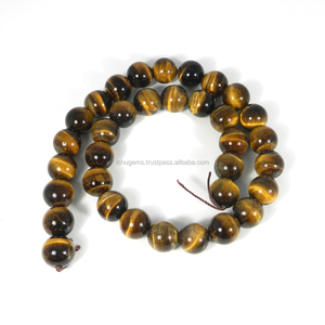 ลูกปัดไทเกอร์อายสุดพิเศษ ขนาด 15 นิ้ว 12 มม. รูปทรงกลมเรียบ น้ำหนัก 386.45 กะรัต สีเหลือง รุ่นอิชู เจมส์ รุ่น IG12130 - Product Image 2