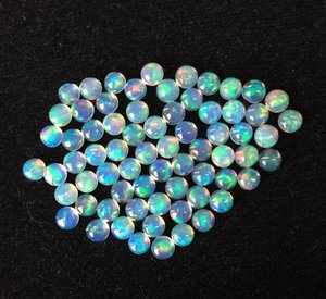 Cabochon en opale de feu éthiopienne naturelle de 4mm AAA + Grade Multi Fire Pierres précieuses en vrac de haute qualité IGI Certified Thermal Treated Wholesale - Product Image 2