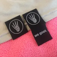 high definition brand hem label for sleeve,loop fold woven hem tag for sleeve