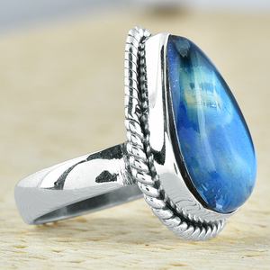 925พลอยแก้วไดโครอิกทรงลูกแพร์สีฟ้าแหวนอัญมณีเงินสเตอร์ลิงเครื่องประดับอินเทรนด์แหวนแฟชั่นสำหรับทุกเพศ - Product Image 3