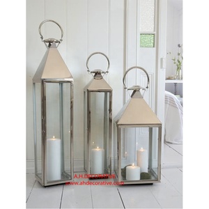 Vente en gros de bougeoirs lanterne marocaine personnalisés bougeoirs décoratifs en métal verre blanc pour la maison et la décoration de Noël - Product Image 1