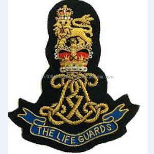 Insignias de diseño personalizado OEM bordadas a mano de alta calidad cosidas hechas de fieltro y tela con logotipo de marca - Product Image 1