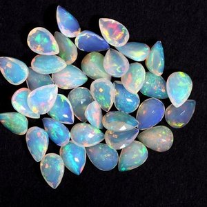 10mm 12mm naturel opale éthiopienne à facettes poire coupe pierres précieuses semi-précieuses en vrac fournisseur maintenant pierres pour l'usine de fabrication de bijoux - Product Image 1