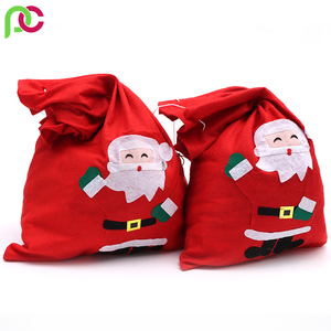 Magnifiques sacs-cadeaux de Noël écologiques en jute de taille moyenne avec impression du Père Noël avec logo imprimé personnalisé Sacs à cordon pour la promotion - Product Image 3
