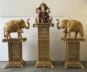 Brass Elephant statue with decorative Lord Ganesh sculpture and metal stand. Unique decor idea