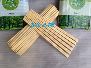 Baguettes jetables en bambou de 21-24 cm fabriquées en bois stocké Twin Sushi Viet Nam avec logo couverture en papier en vrac - Product Image 4