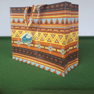 ถุงช้อปปิ้งแบบสาน PP คุณภาพสูงจากเวียดนาม สีตามสั่ง พร้อมหูหิ้วขนาด 3x50 ซม. - Product Image 1