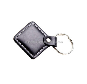 Venta al por mayor de llaveros de cuero PU personalizados, accesorios para llaveros de primera calidad - Product Image 1