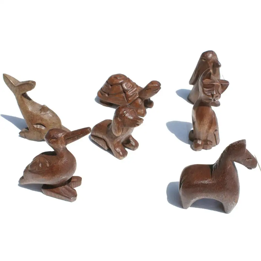 Animal wood carvings, handmade small wooden statues of different animals for sale, Ecuador