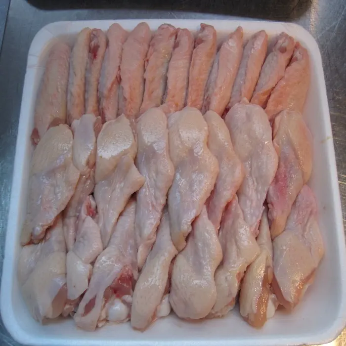 2021 ventas deshuesada congelada pechuga de pollo sin piel muslos 1,4-2,2 lbs/alas de pollo precio de descuento de 1,5-2 lbs muslos de pollo