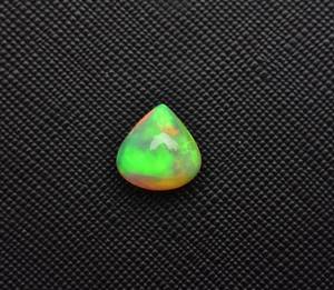 พลอยโอปอลเอธิโอเปียธรรมชาติรูปทรงวงรีเจียระไนรูปทรงหลังเบี้ย,อัญมณีขายส่งจำนวนมากสำหรับการทำเครื่องประดับ,เพชรพลอยปรับเทียบเหลี่ยมเพชรพลอย - Product Image 1