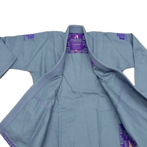 Venta al por mayor de trajes de Jiu-Jitsu Gi brasileños personalizados, uniforme azul tejido con perlas, 100% algodón, 100%, ropa de artes marciales con logotipo personalizado preencogido - Product Image 1