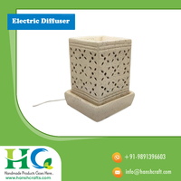 Diffuseur d'huiles essentielles électrique |   Diffuseur d'arômes en céramique artisanal pour la relaxation à domicile, vente en gros, fabricant indien, vente chaude