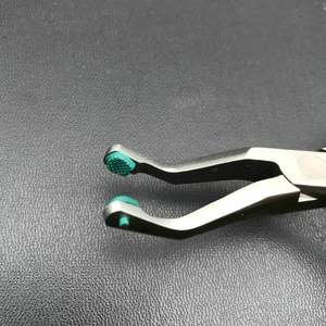 Instrumento de ortodoncia Dental con punta de seguridad, alicates de eliminación de corona delantera, almohadilla verde - Product Image 3