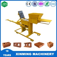 Machine à briques en argile et en ciment manuelle mobile de haute qualité Xm2-40 pour pavés creux autobloquants en technologie canadienne et allemande 6mpa