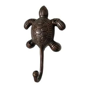 Gancho de pared desmontable de tortuga de latón con acabado antiguo - Product Image 1