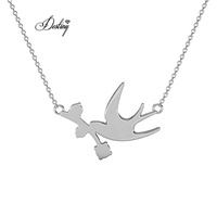 Pendentif oiseau colombe flambée Daisini orné de cristaux Swarovski Collier plaqué or blanc 18 carats de haute qualité