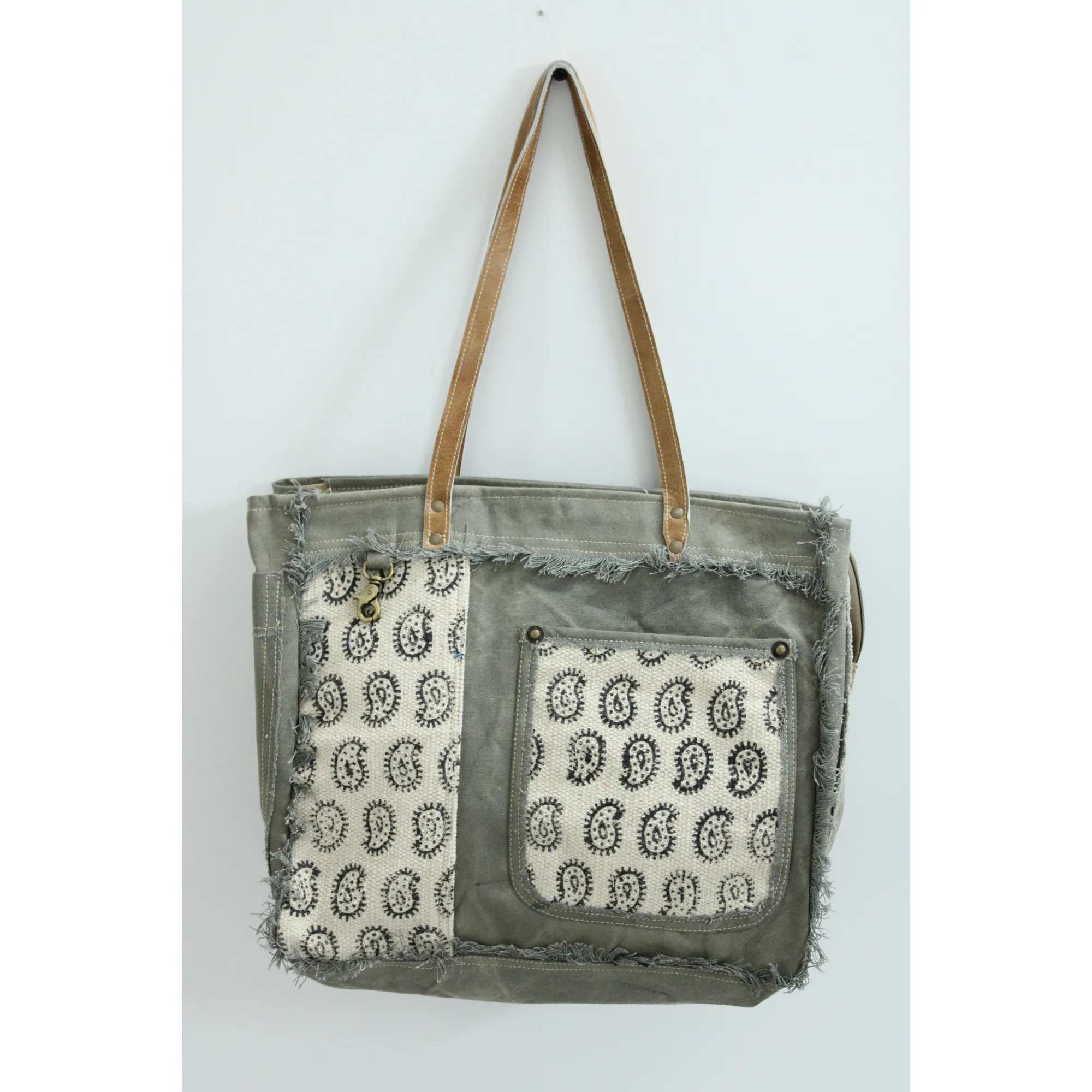 FLORAL pattern stitched FRONT pocket with green fabric, attractive design and eye catchy canvas bag