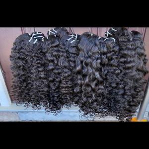 100% d'extensions de cheveux humains ondulés naturels bruts, paquets de cheveux vierges non traités à cuticule alignée, fournisseur en gros Inde - Product Image 1
