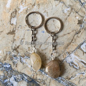 LLavero de piedra rutilo dorada, en línea, en venta - Product Image 1