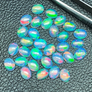 Meilleure qualité AAA naturel 10x12mm opale éthiopienne Cabochon ovale pierres précieuses en vrac pour la fabrication de bijoux fournisseur - Product Image 2