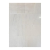 Carreaux de marbre dolomite blanc pur, finition polie, cuisine moderne, écologique, durable