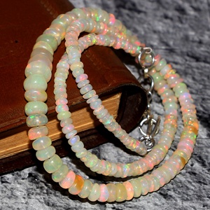 Etíope Welo Opal Multi Fire Collar de cuentas de piedras preciosas sueltas Romántico Liso Rondelle Forma Precio al por mayor por quilate Natural - Product Image 1