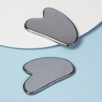 Pierre Terahertz en forme de coeur Gua Sha et outils de massage pour le drainage lymphatique, le soulagement des tensions et la relaxation du visage