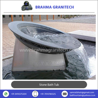 Baignoires et bains à remous en marbre et pierre calcaire Brahma Granitech avec fonctions de massage relaxant, drain central, accessoire de vidange inclus