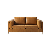 Canapé convertible trois places pour petit appartement, design nordique moderne, en cuir véritable Chesterfield