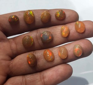 A-One Quality Mexican Fire Opal Oval Loose Cabochon Stone para personalizar el tamaño de la joyería - Product Image 1