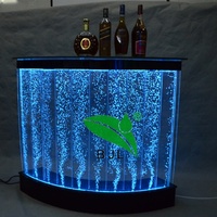 Comptoir de réception de bar à jus mobile illuminé par LED moderne design avec panneau mural à bulles d'eau