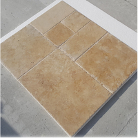 Collection 2025 Premium Select de parquet en travertin naturel de Versailles, motifs français, finition semi-mate, effet vieilli