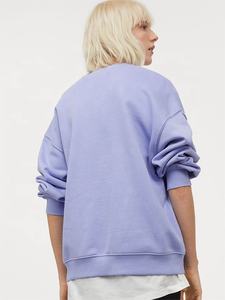 เสื้อสเวตเตอร์คอกลมแขนยาวของผู้หญิงเสื้อครอปมีฮู้ดเสื้อแนวสตรีทแฟชั่นสวมใส่สบายด้านหน้าโลโก้100% - Product Image 3