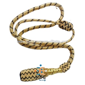 Nœuds de sabre cérémoniels en or avec croix noire, vente en gros, nœuds de sabre tricotés à la main avec du matériau doré métallique - Product Image 1