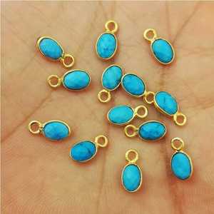 Colgante con forma pequeña ovalada turquesa, 4x6mm, oro, bisel Vermeil - Product Image 2