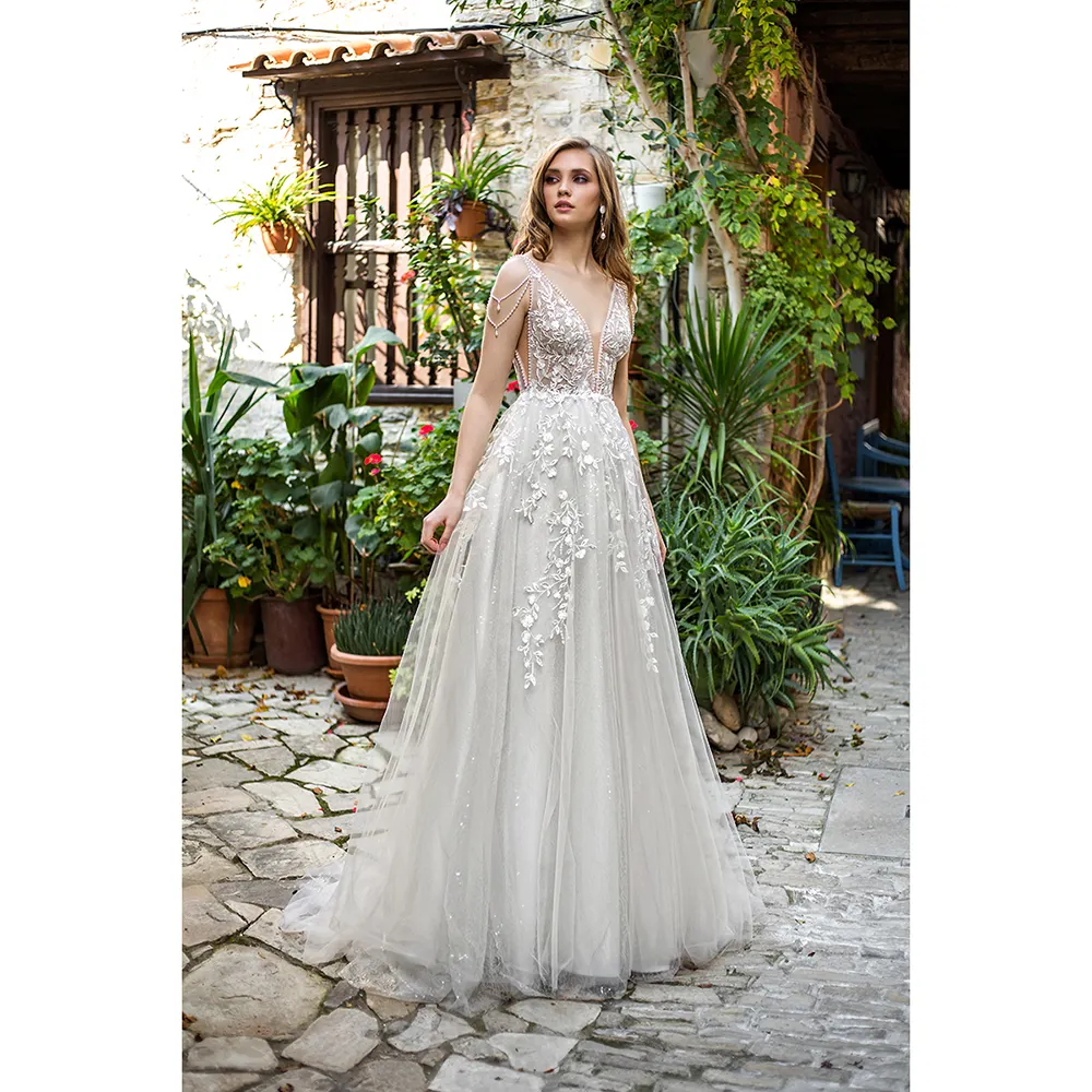 High quality wedding dress for ladies Estelavia "Kiara", corsage type, laced tulle skirt, pearls falling from the shoulders