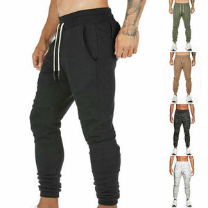 Pantalones de jogging ajustados para hombre, chándal de lana de algodón para trotar, personalizados, con múltiples bolsillos, venta al por mayor - Product Image 1