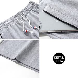 กางเกงขาสั้นออกกำลังกายของผู้ชาย,กางเกงกีฬาขาสั้นมีกระเป๋าซิปสีพื้นกางเกงขาสั้นสำหรับนักวิ่งชายหาดแห้งเร็วพิเศษสำหรับฤดูร้อน - Product Image 6