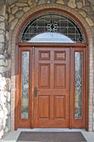 Porte double en bois massif de style traditionnel pour villa, porte d'entrée en bois ovale finie avec des motifs ronds